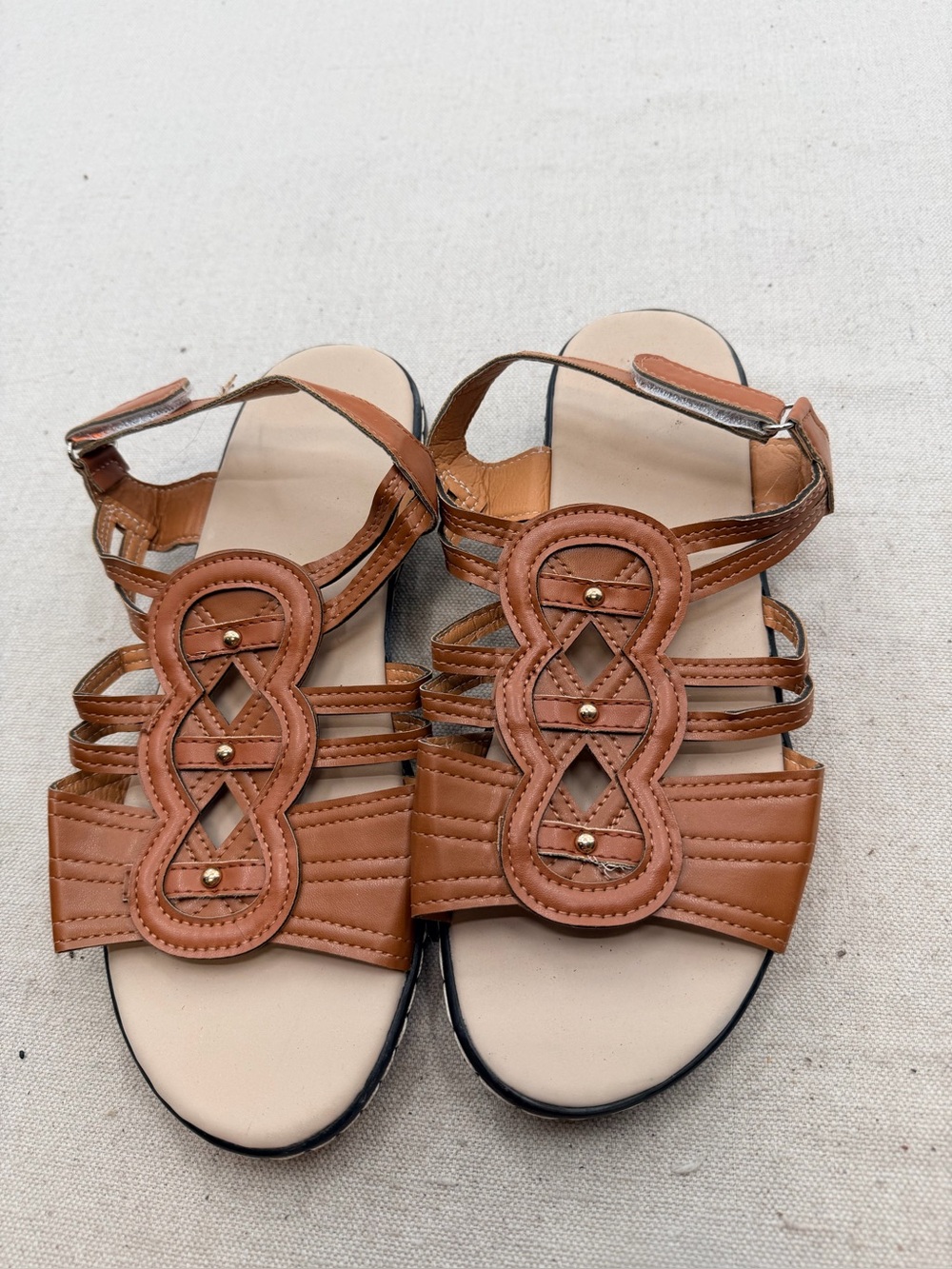 Women's Brown Strappy Leather Sandals with Decorative Medallion
